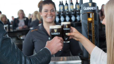 Visitors enjoying Guinness pints on top of the Guinness Storehouse near Ariel House Ballsbridge