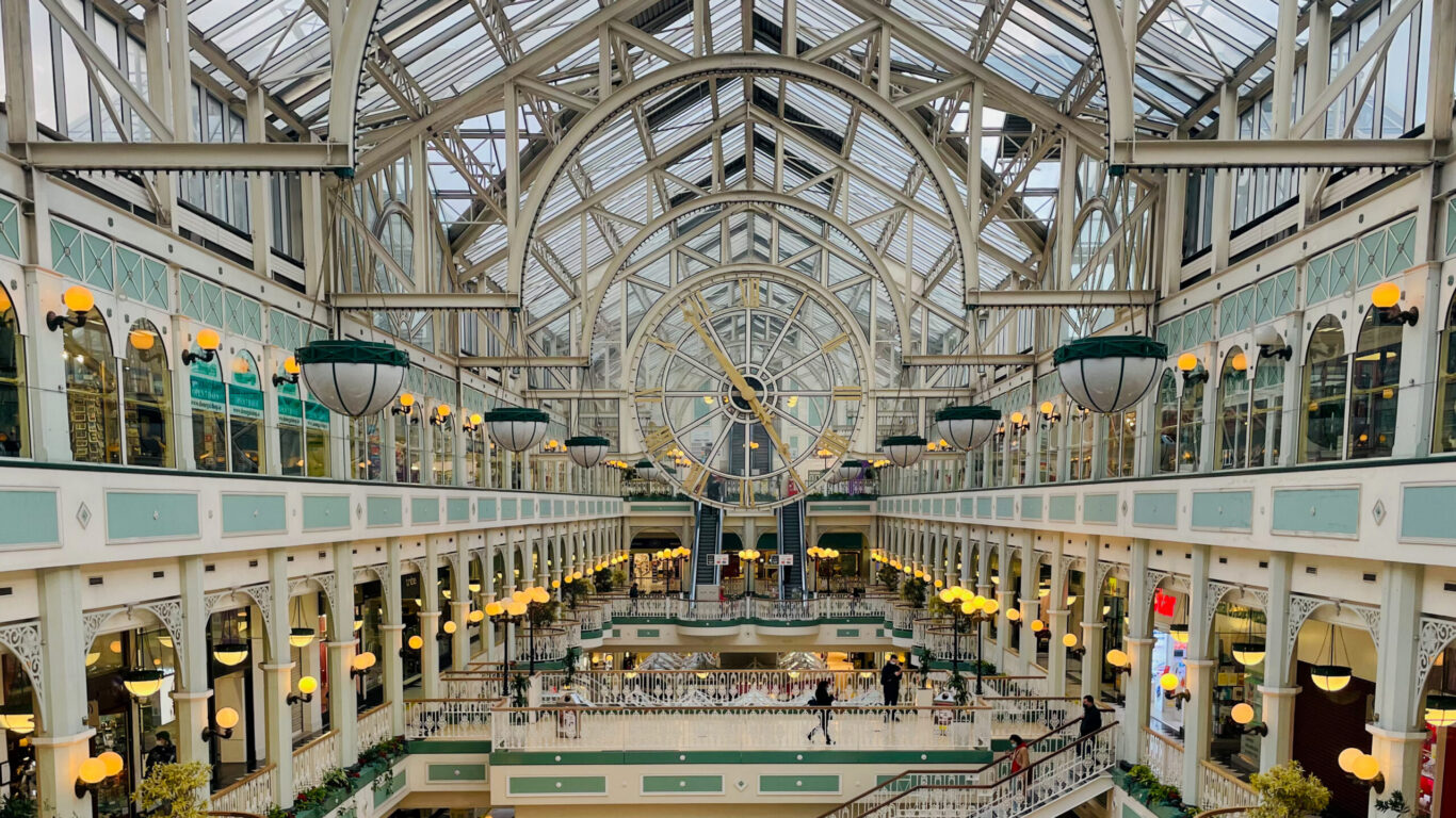 Interior of Dublin shopping centre with glass roof and shops near Ariel House