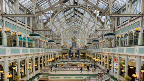 Interior of Dublin shopping centre with glass roof and shops near Ariel House