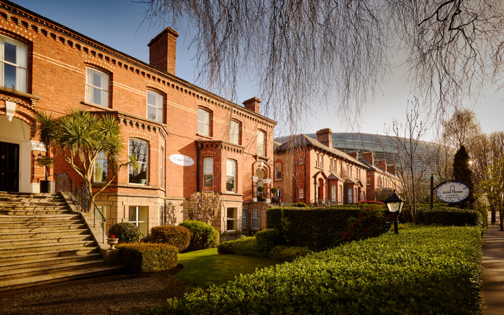 Exterior of Ariel House Victorian guesthouse in Ballsbridge Dublin 4 with gardens and red brick buildings