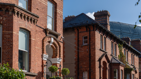 close up of the exterior of ariel house and aviva stadium appearing in the background