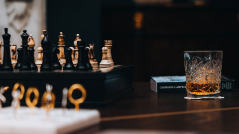 Whiskey glass and chess board in Ariel House Dublin drawing room